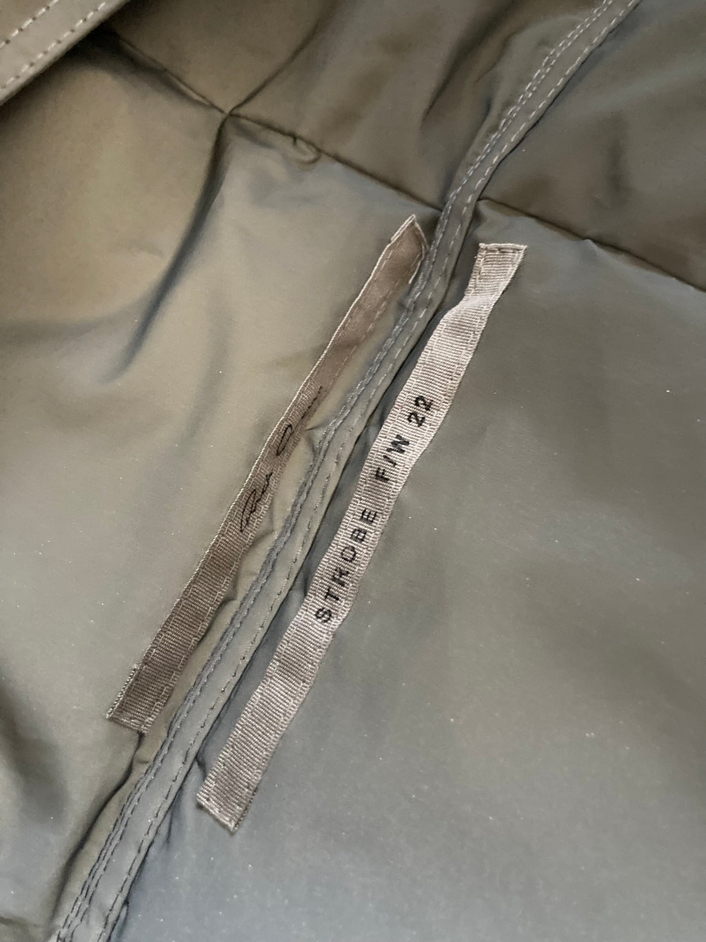 F/W 22 "STROBE" Runway Reflecting Glass Fibre Flight Down-Filled Puffer Jacket in Reflex & Pearl Size 50/M